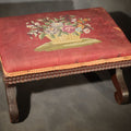 Lot 118 - Antique Empire-Style Needlepoint Upholstered Footstool with Floral Basket Motif and Scrolled Legs, 13-1/2" L