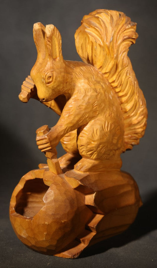Vintage Hand-Carved Wood Folk Art Squirrel Figure Depicted Carving a Nut Shell with Mallet and Chisel