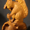 Lot 121 - Vintage Hand-Carved Wood Folk Art Squirrel Figure Depicted Carving a Nut Shell with Mallet and Chisel, 7-1/2" H