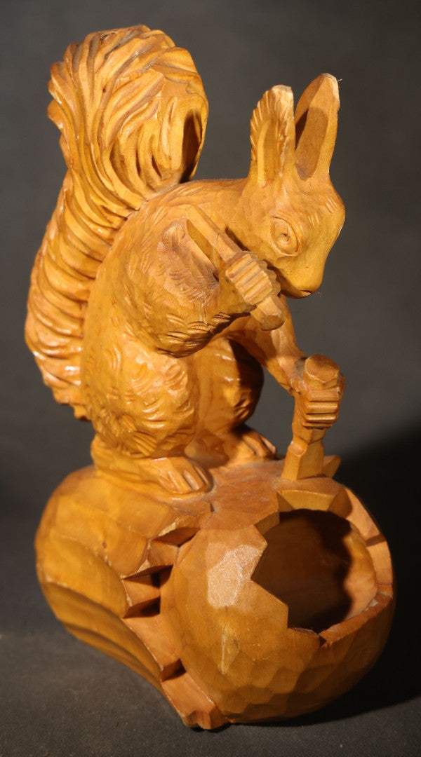 Vintage Hand-Carved Wood Folk Art Squirrel Figure Depicted Carving a Nut Shell with Mallet and Chisel
