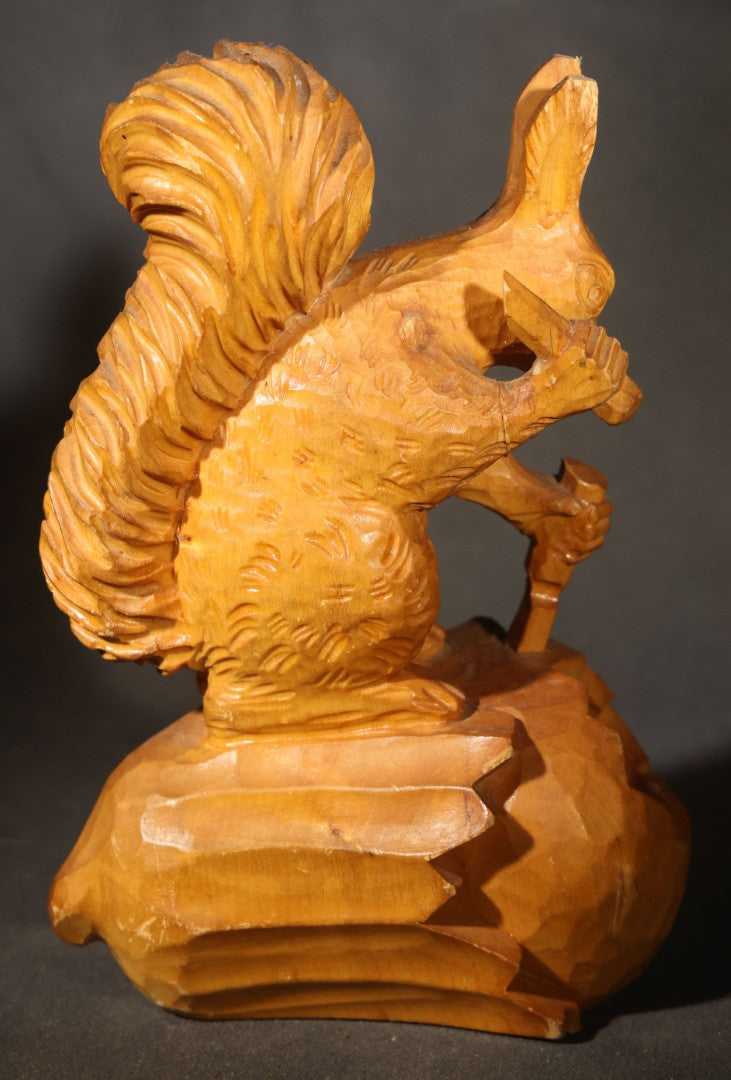 Vintage Hand-Carved Wood Folk Art Squirrel Figure Depicted Carving a Nut Shell with Mallet and Chisel