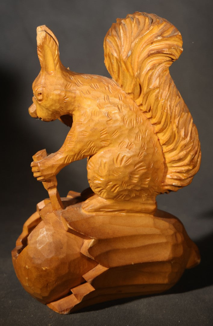 Vintage Hand-Carved Wood Folk Art Squirrel Figure Depicted Carving a Nut Shell with Mallet and Chisel