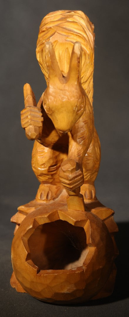 Vintage Hand-Carved Wood Folk Art Squirrel Figure Depicted Carving a Nut Shell with Mallet and Chisel