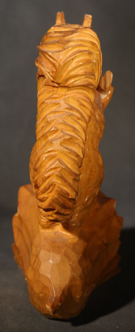 Vintage Hand-Carved Wood Folk Art Squirrel Figure Depicted Carving a Nut Shell with Mallet and Chisel