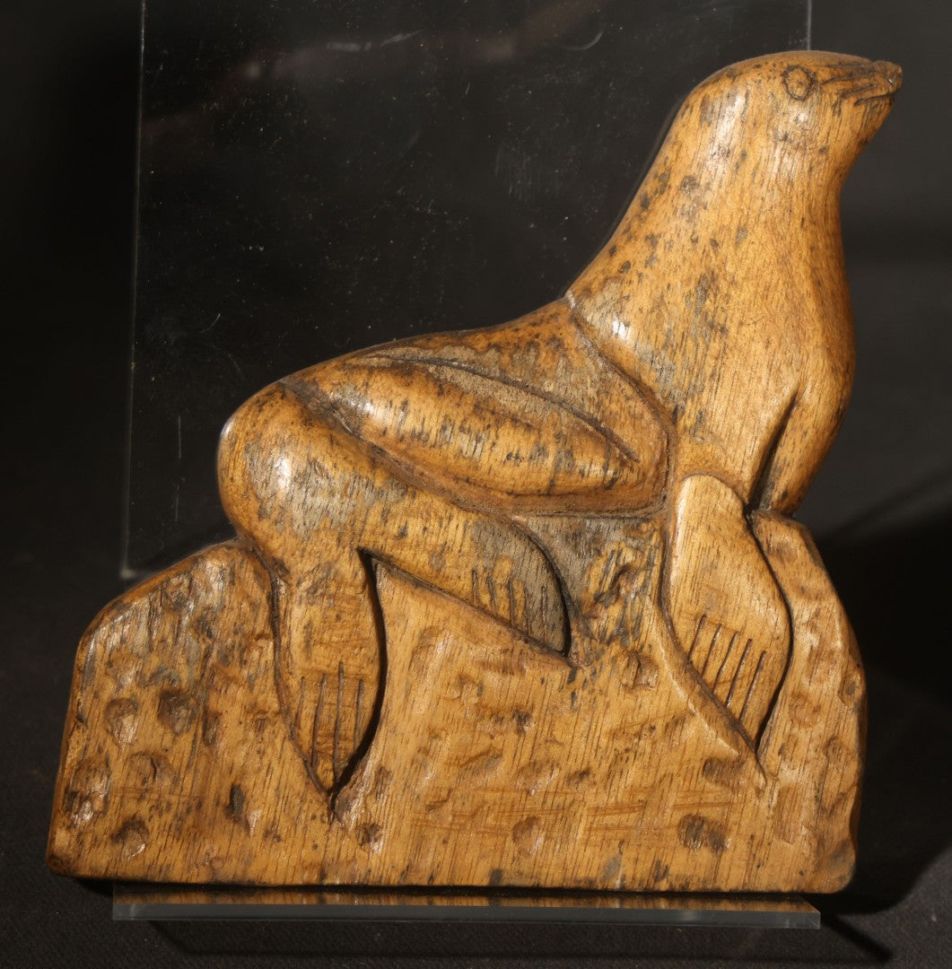 Vintage Hand-Carved Folk Art Wooden Seal Figure with Wire Hanging Loop