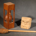 Lot 123 - Grouping of Three Vintage Folk Art Wood Carvings Including Ball-In-Cage Whimsy, Carved Face Block, and Carved Face on a Stick