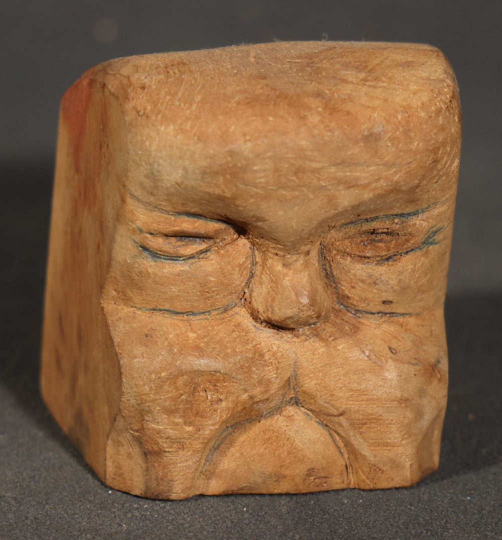 Grouping of Three Vintage Folk Art Wood Carvings including Ball-in-Cage Whimsy, Carved Face Block, and Carved Face on a Stick