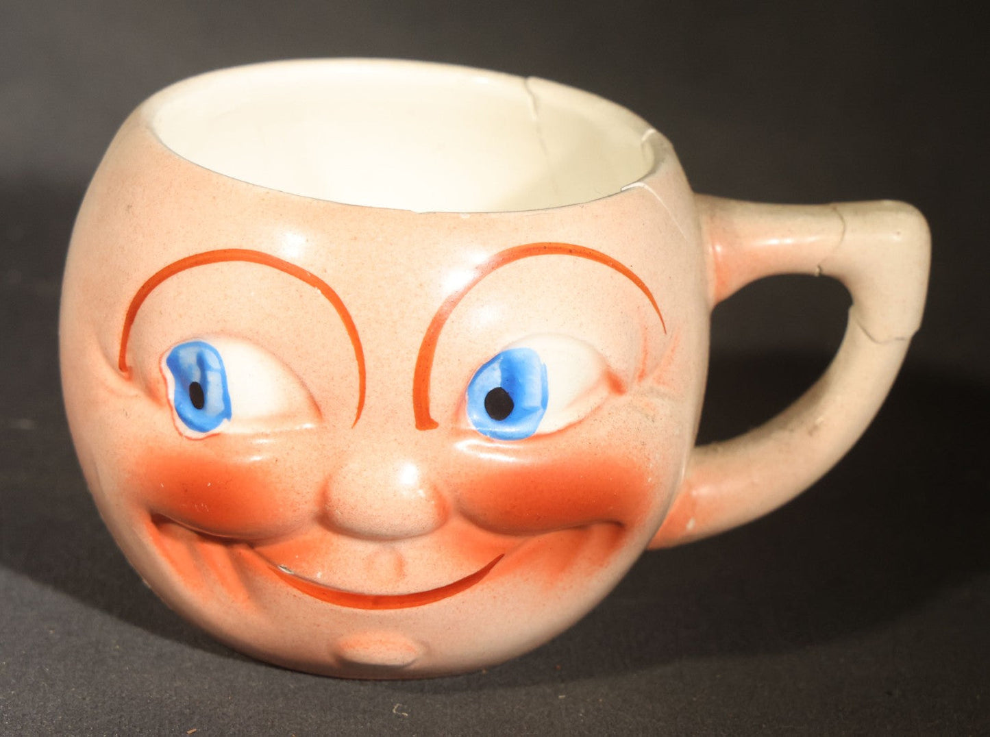 Trio of Vintage Figural Face Ceramics including Brown Glazed Smiley Mug, Anthropomorphic Tomato Jug with Lid, and Czechoslovakia Porcelanit Smiling Face Mug