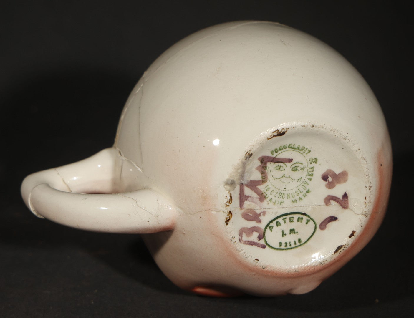 Trio of Vintage Figural Face Ceramics including Brown Glazed Smiley Mug, Anthropomorphic Tomato Jug with Lid, and Czechoslovakia Porcelanit Smiling Face Mug