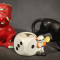 Lot 132 - Trio of Vintage Porcelain Figures Including Red Bulldog, Black Stalking Panther, and Dog with Dice