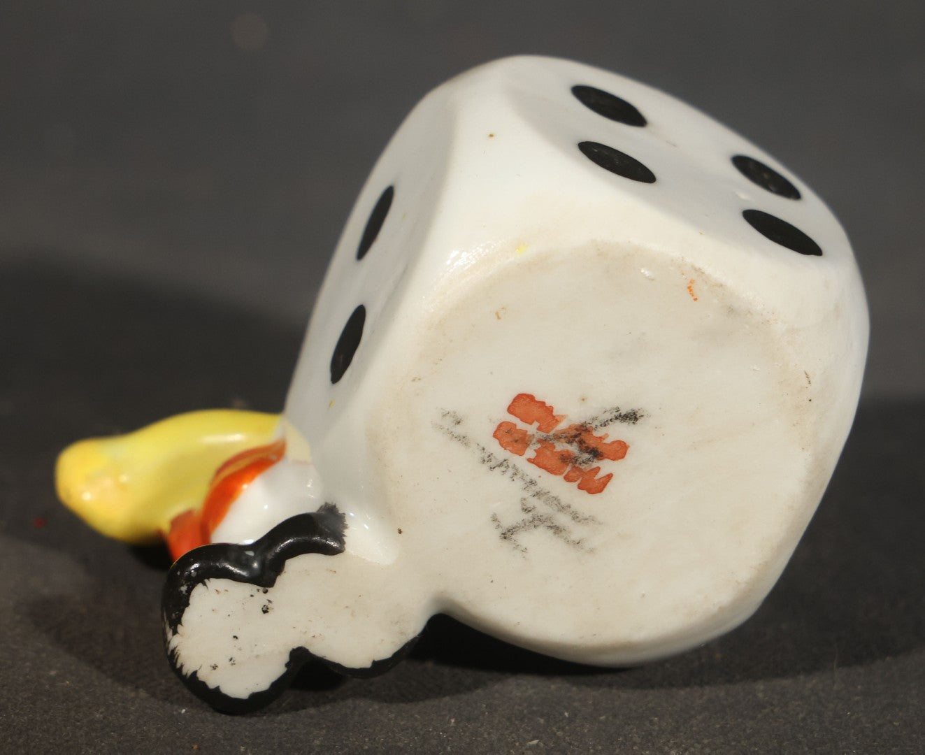Trio of Vintage Porcelain Figures including Red Bulldog, Black Stalking Panther, and Dog with Dice