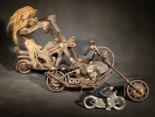 Trio of Antique and Vintage Motorcycle Figurines including Painted Cast Metal Police Motorcycle Toy Marked "Made U.S.A.," Scrap Metal Chopper Sculpture, and Carved Wood Chopper with Rider