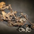 Lot 133 - Trio of Antique and Vintage Motorcycle Figurines Including Painted Cast Metal Police Motorcycle Toy Marked "Made U.S.A.," Scrap Metal Chopper Sculpture, and Carved Wood Chopper with Rider