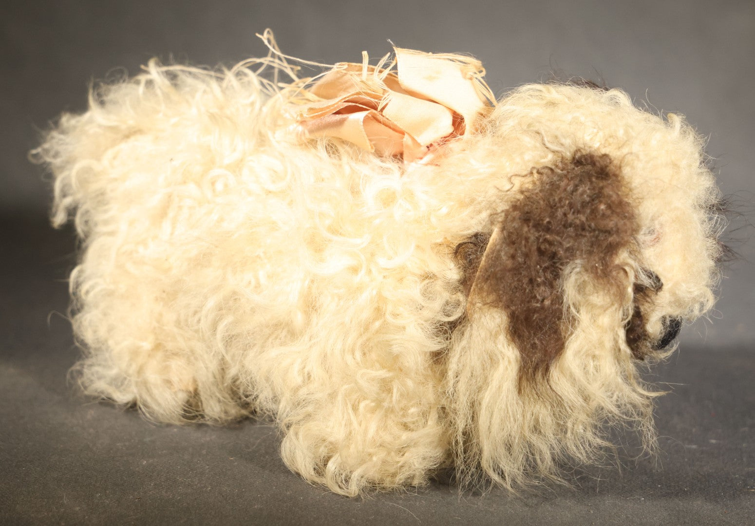 Vintage Stuffed Toy Dog with Curly Cream and Brown Fur and Ribbon Bow