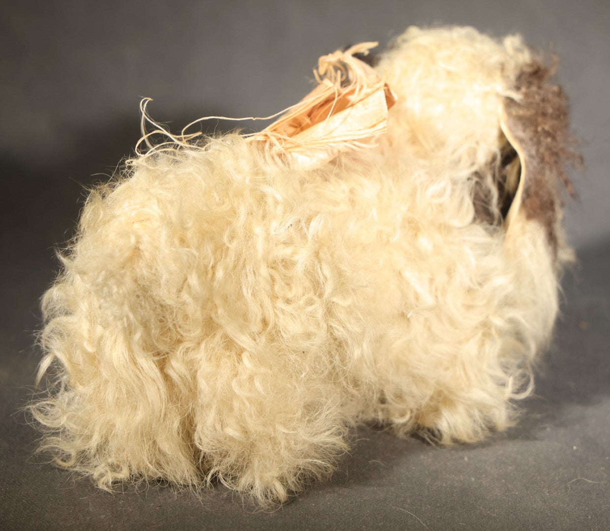 Vintage Stuffed Toy Dog with Curly Cream and Brown Fur and Ribbon Bow