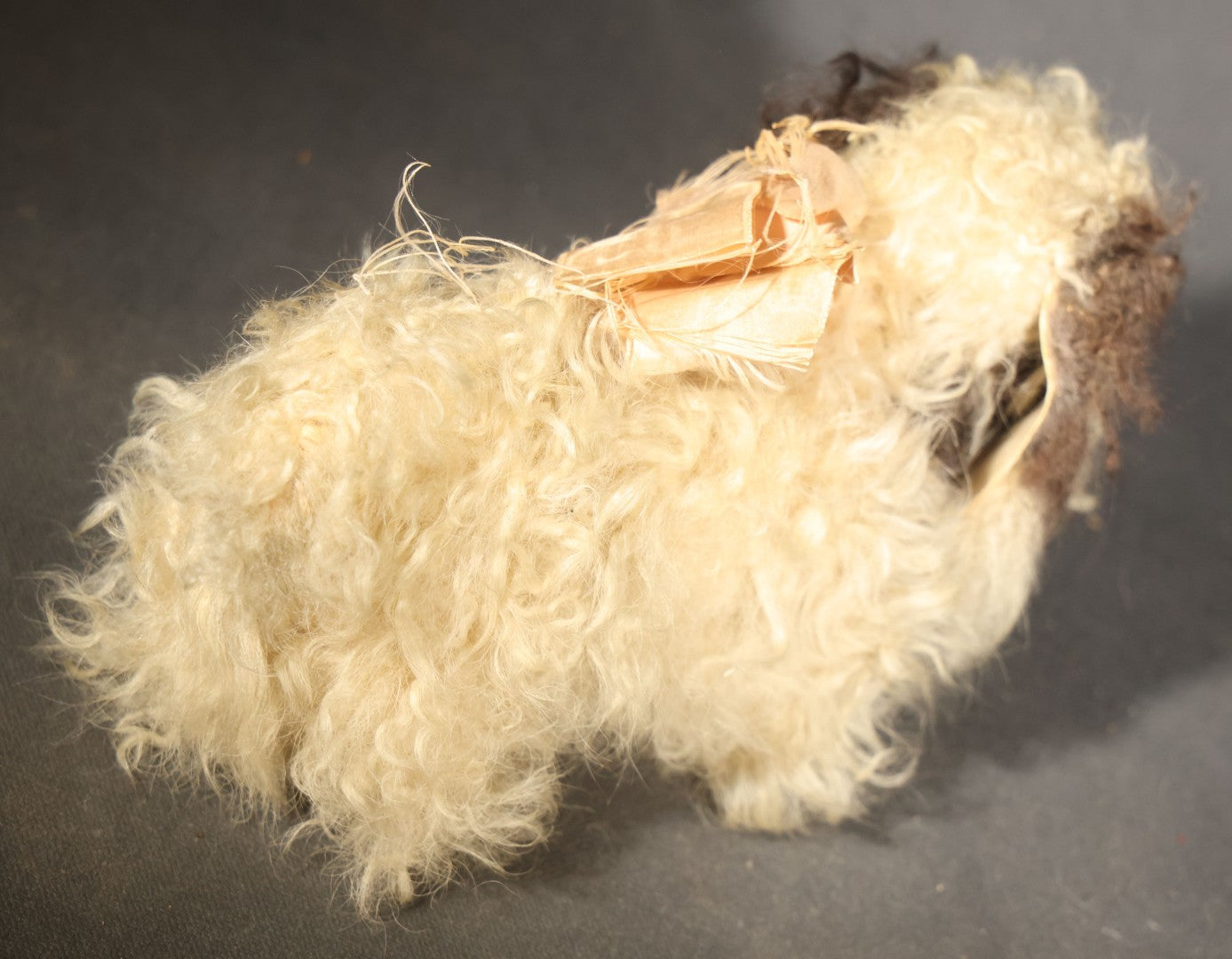 Vintage Stuffed Toy Dog with Curly Cream and Brown Fur and Ribbon Bow