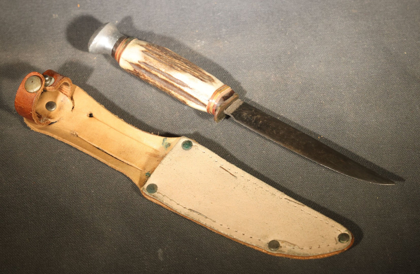 Vintage Fixed-Blade Knife with Stag Antler Handle and Leather Sheath