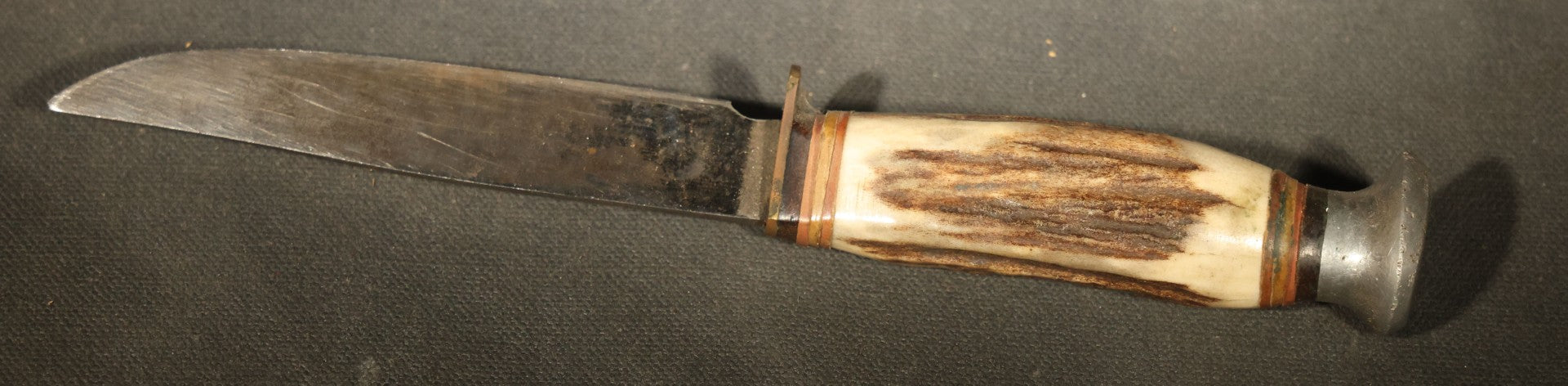 Vintage Fixed-Blade Knife with Stag Antler Handle and Leather Sheath