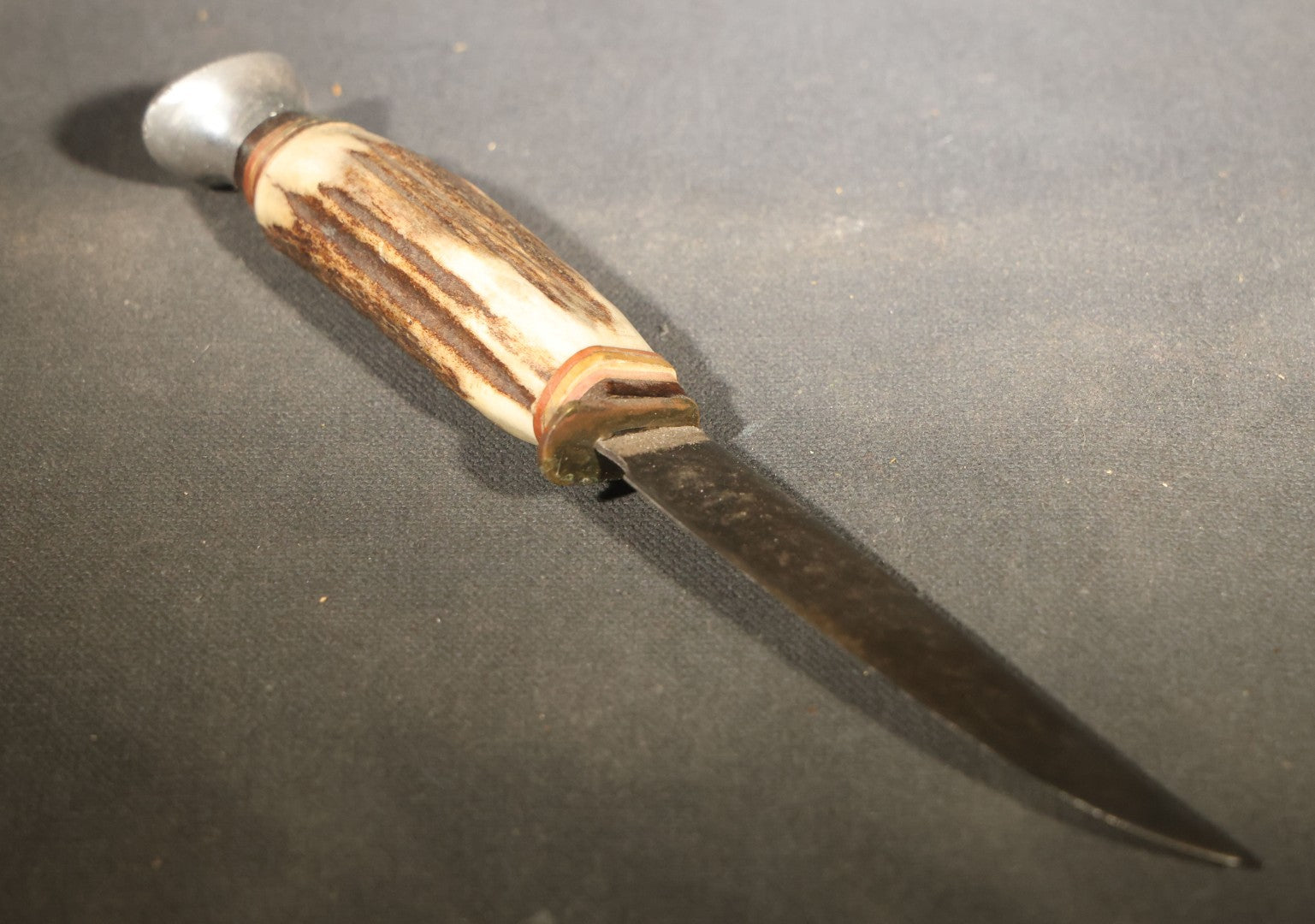 Vintage Fixed-Blade Knife with Stag Antler Handle and Leather Sheath