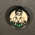 Lot 145 - Vintage Risque Betty Boop Pinback Button with Black, White, and Green Graphics