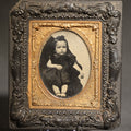 Lot 159 - Antique 1/9th Plate Ruby Ambrotype Hidden Mother Photograph of Jesse Oliver Howard as a Young Child Held by His Mother in Thermoplastic Frame