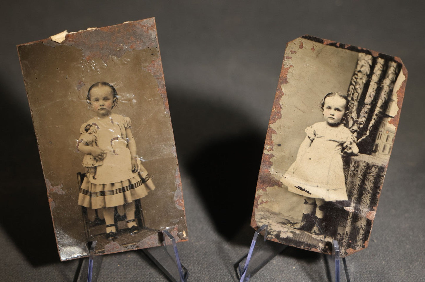 Pair of Antique Tintype Photographs of the Same Young Girl including One Holding a Doll