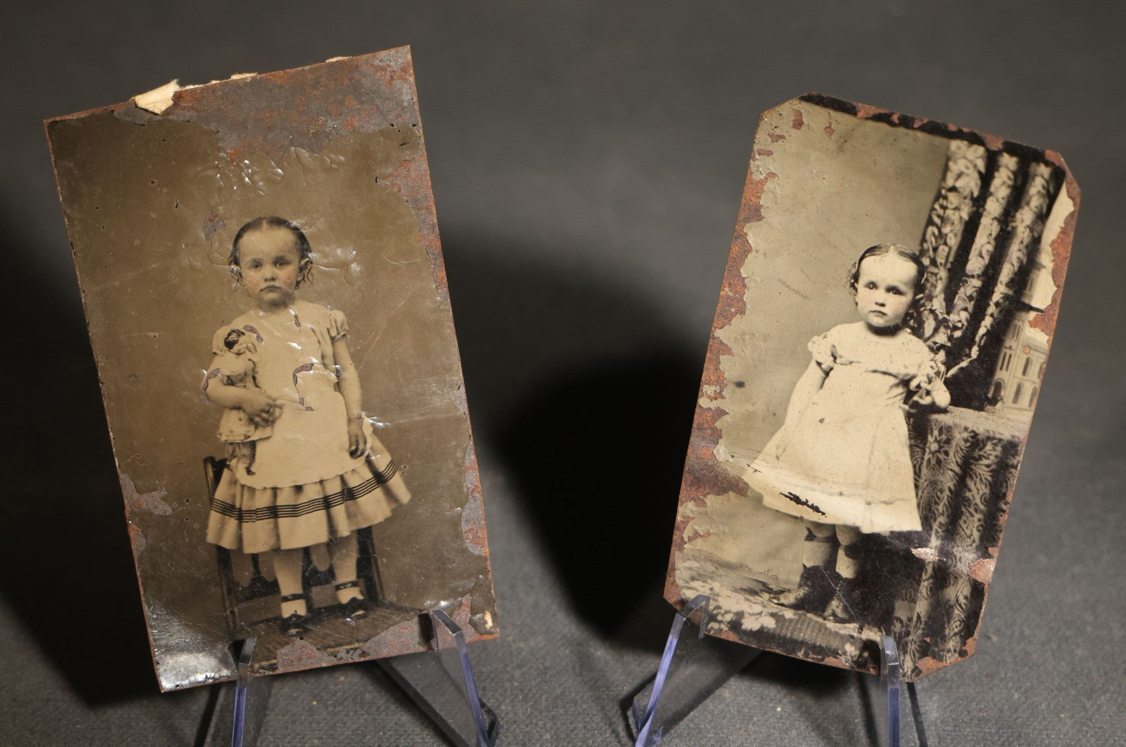 Pair of Antique Tintype Photographs of the Same Young Girl including One Holding a Doll