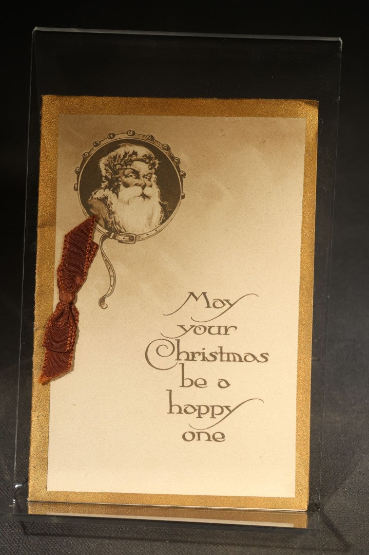 Grouping of Four Antique Photographs and Ephemera including Two Cabinet Card Photographs, a Board-Mounted Photograph of a House with Figures, and a Gibson Santa Claus Christmas Card