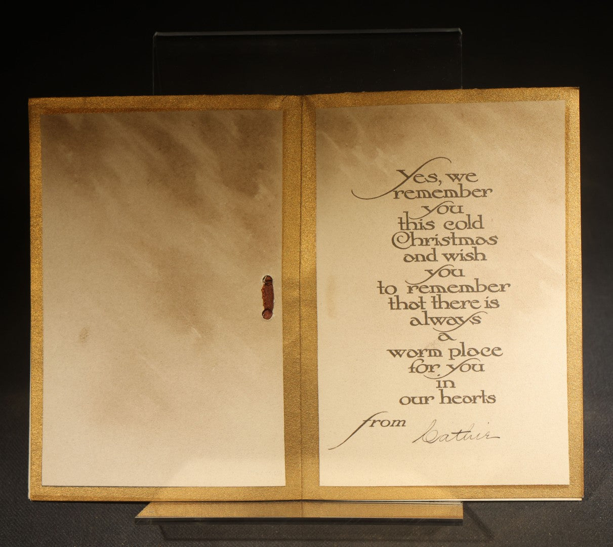 Grouping of Four Antique Photographs and Ephemera including Two Cabinet Card Photographs, a Board-Mounted Photograph of a House with Figures, and a Gibson Santa Claus Christmas Card