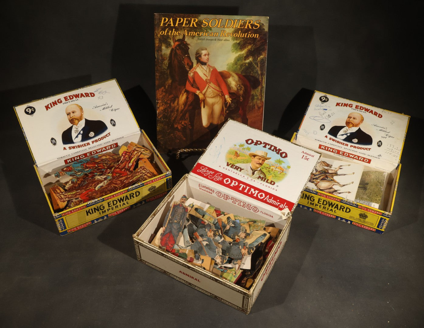 Grouping of Antique and Vintage Paper Soldiers and Military Figures including Chromolithograph Cutout Infantry and Cavalry, "Paper Soldiers of the American Revolution" Book, and Valiant Miniatures Metal Figure Kits