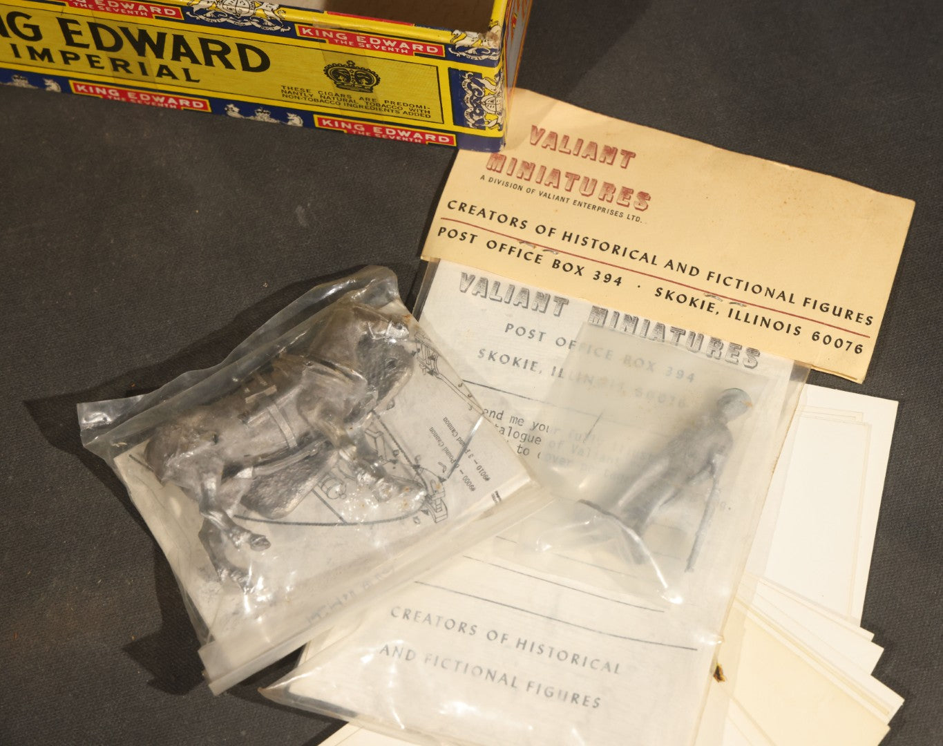 Grouping of Antique and Vintage Paper Soldiers and Military Figures including Chromolithograph Cutout Infantry and Cavalry, "Paper Soldiers of the American Revolution" Book, and Valiant Miniatures Metal Figure Kits