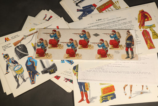 Grouping of Vintage and Antique Napoleonic French Military Uniform Plates and Uncut Paper Soldiers including "Le Plumet" RIGO Edition Hand-Colored Plates with Text Sheets and Zouaves Sheet