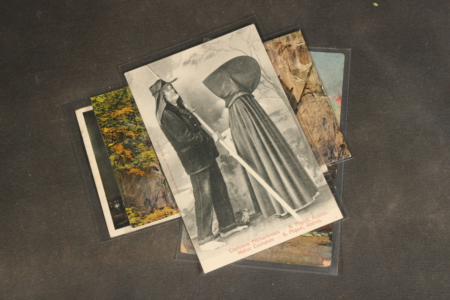 "Liza's Picks" Grouping of 30 Antique and Vintage Postcards including Massachusetts Map, Indian Sweetmeat Seller, Hebrew-Inscribed Cards, Castle Architecture, and Religious Subjects