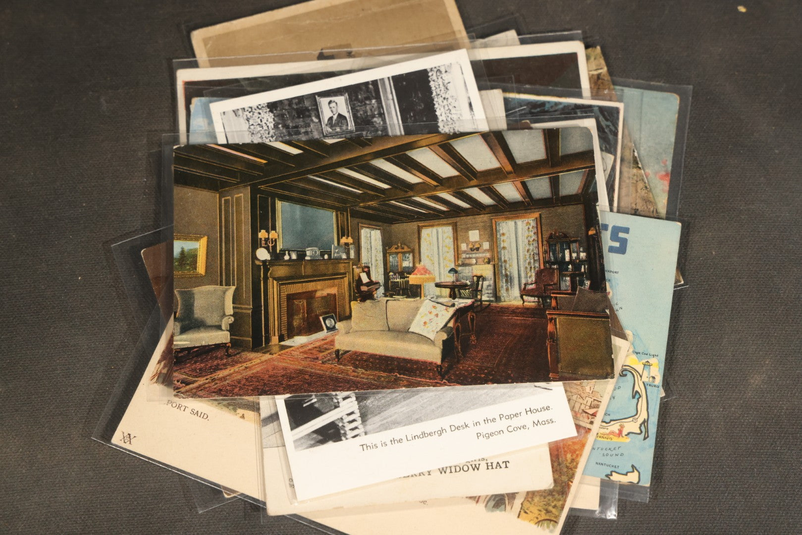 "Liza's Picks" Grouping of 30 Antique and Vintage Postcards including Massachusetts Map, Indian Sweetmeat Seller, Hebrew-Inscribed Cards, Castle Architecture, and Religious Subjects