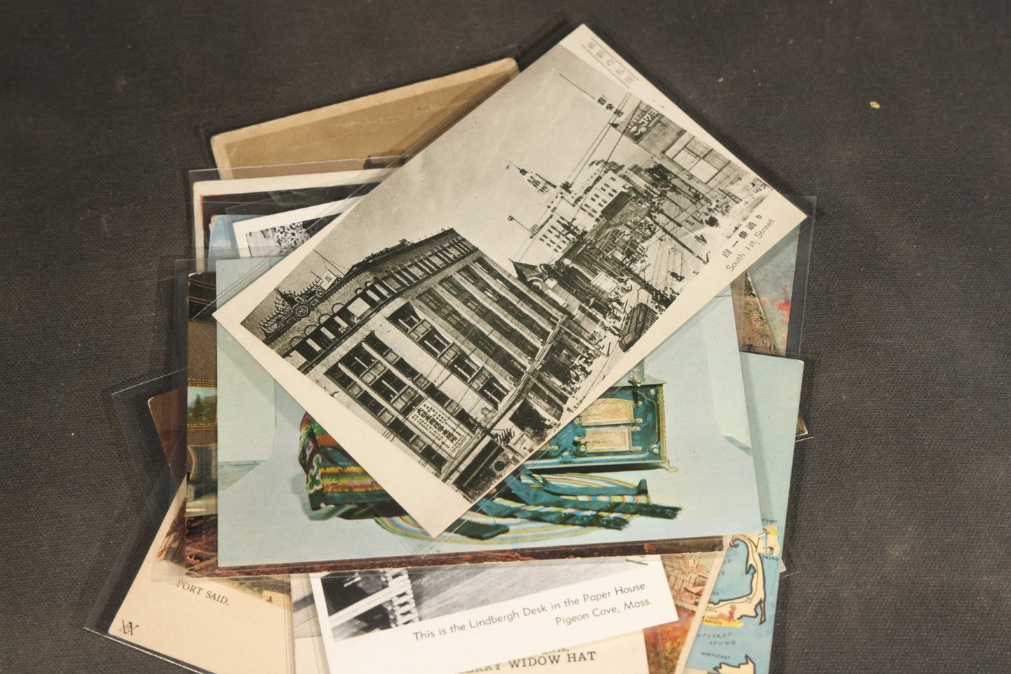 "Liza's Picks" Grouping of 30 Antique and Vintage Postcards including Massachusetts Map, Indian Sweetmeat Seller, Hebrew-Inscribed Cards, Castle Architecture, and Religious Subjects