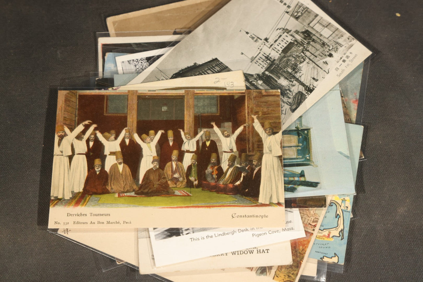 "Liza's Picks" Grouping of 30 Antique and Vintage Postcards including Massachusetts Map, Indian Sweetmeat Seller, Hebrew-Inscribed Cards, Castle Architecture, and Religious Subjects