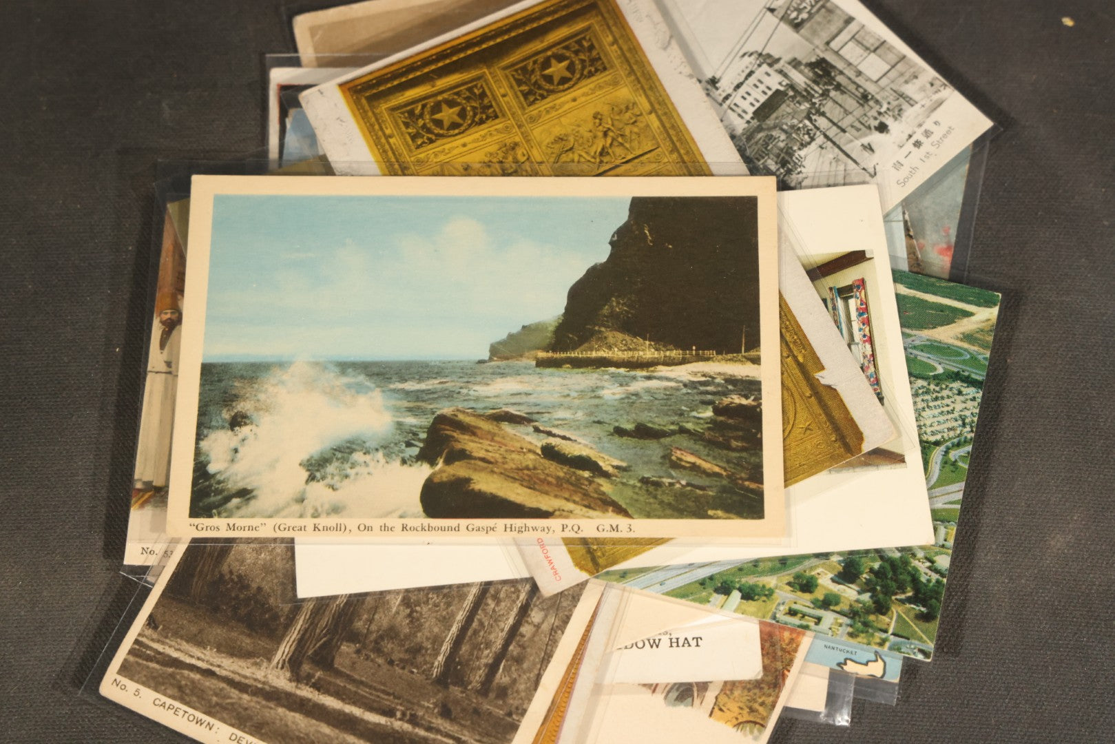 "Liza's Picks" Grouping of 30 Antique and Vintage Postcards including Massachusetts Map, Indian Sweetmeat Seller, Hebrew-Inscribed Cards, Castle Architecture, and Religious Subjects