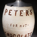 Lot 046 - Antique "Peter's for Hot Chocolate" Soda Fountain Advertising Canister with Metal Lid, Manufactured by Clinchfield China, 10-1/2" H