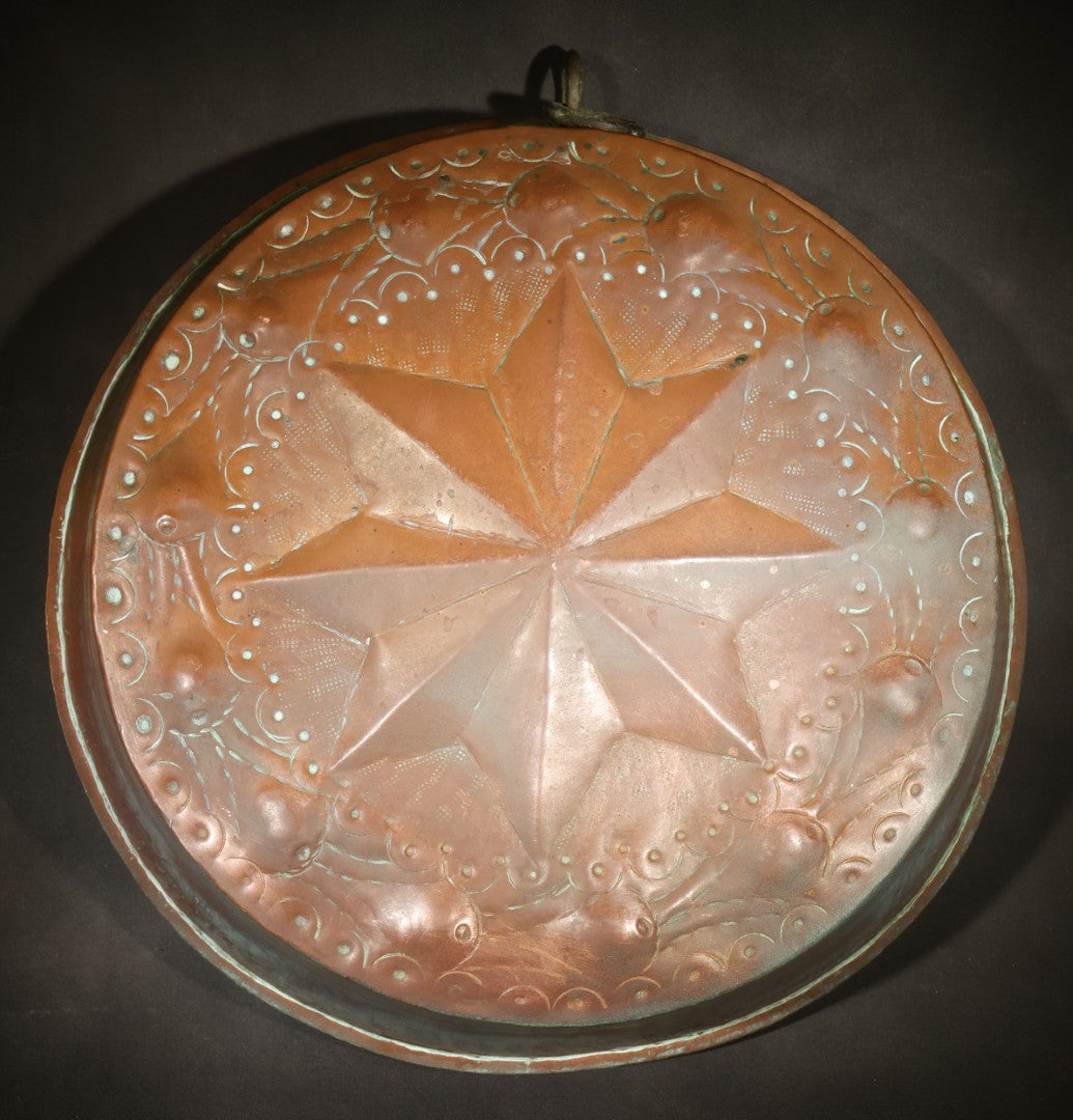 Antique Copper Food Mold with Embossed Eight-Pointed Star and Scroll Decoration, Tin-Lined Interior, Iron Hanging Ring