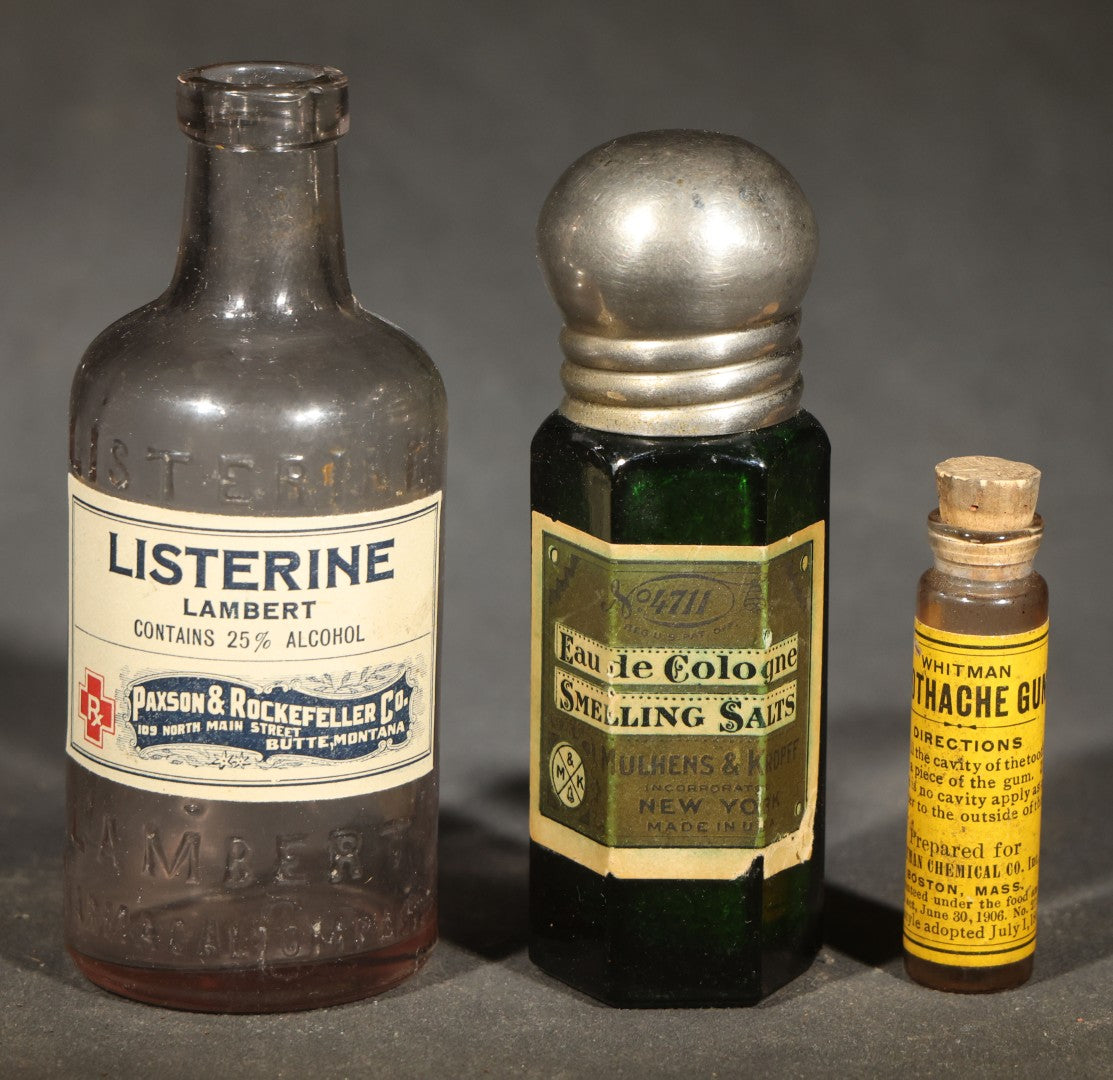 Trio of Antique Labeled Bottles including Listerine from Paxson & Rockefeller Co. of Butte, Montana, No. 4711 Eau de Cologne Smelling Salts by Mulhens & Kropff, and Whitman Toothache Gum