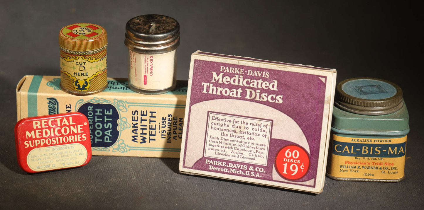 Grouping of Six Vintage Pharmaceutical and Personal Care Products including Parke-Davis Medicated Throat Discs, Rectal Medicone Suppositories, and Cal-Bis-Ma Alkaline Powder