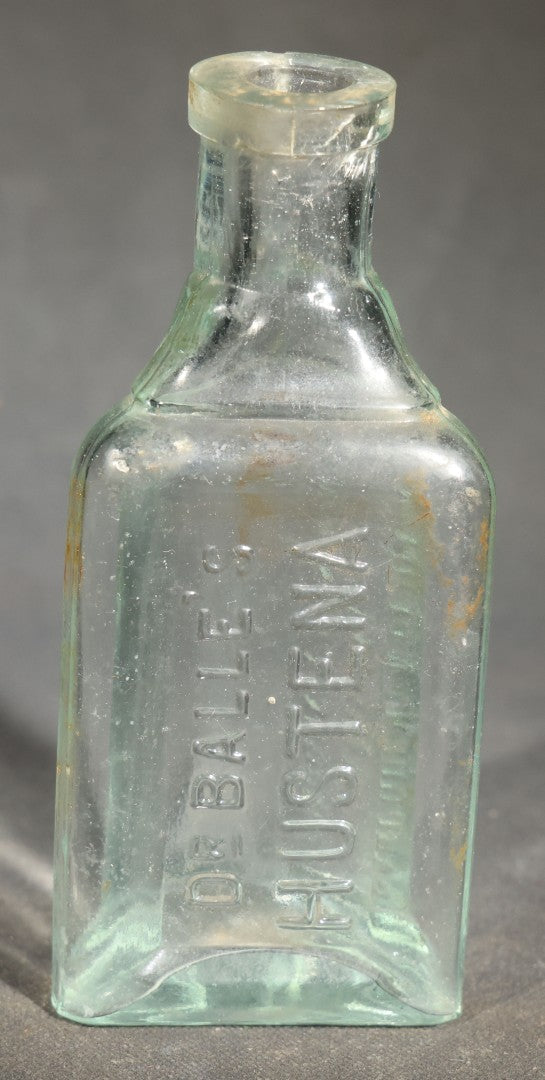 Grouping of Five Antique Embossed Glass Bottles including Remington and Gibbs Sulpho-Napthol