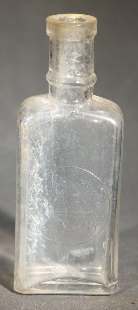 Grouping of Five Antique Embossed Glass Bottles including Remington and Gibbs Sulpho-Napthol