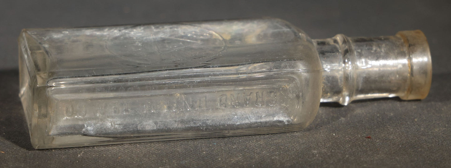 Grouping of Five Antique Embossed Glass Bottles including Remington and Gibbs Sulpho-Napthol