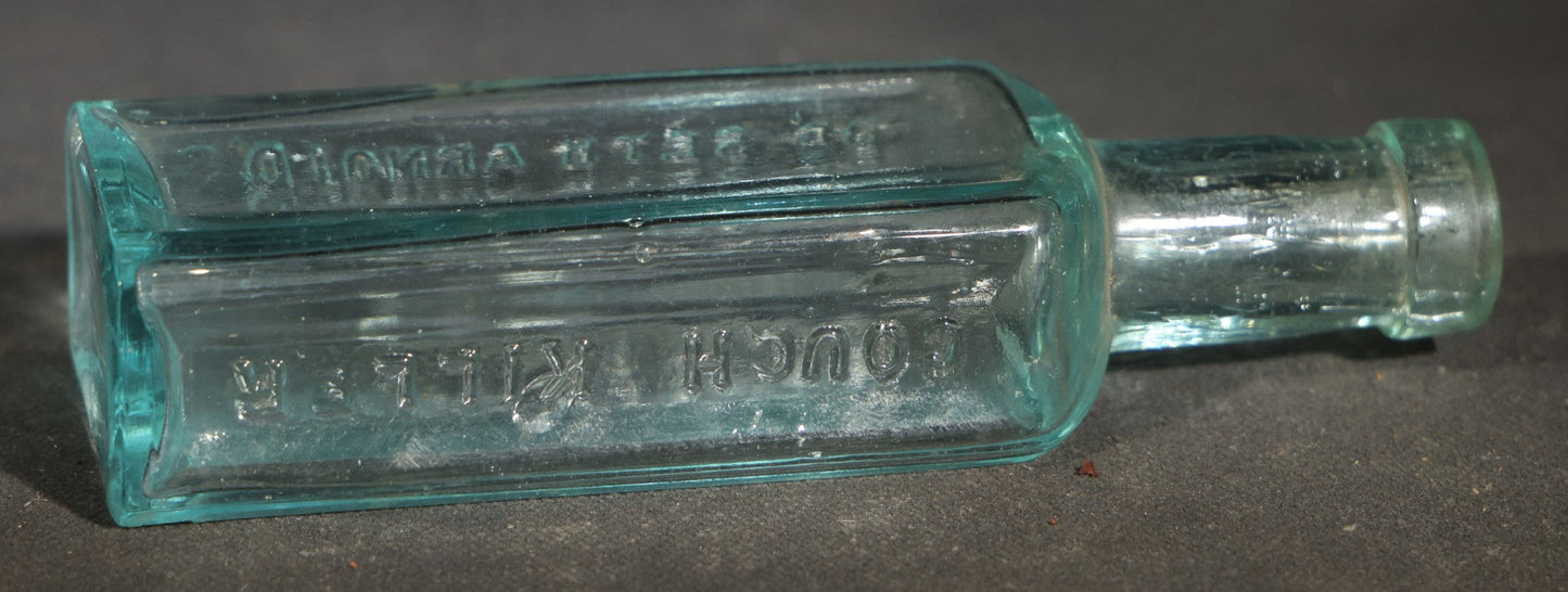 Grouping of Five Antique Embossed Glass Bottles including Remington and Gibbs Sulpho-Napthol