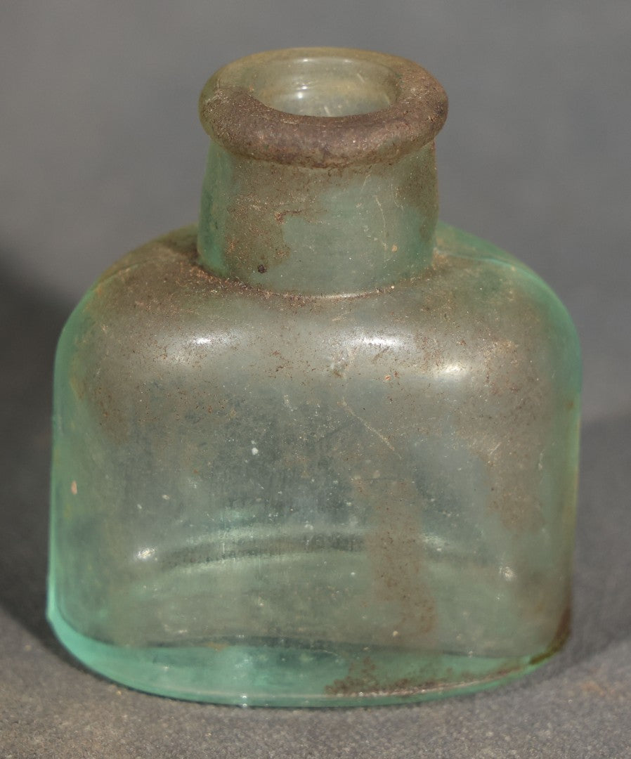 Grouping of Seven Antique Glass Bottles including Ethyl Chloride U.S.P. Anaesthesia Tube and Embossed Pharmaceutical Bottles