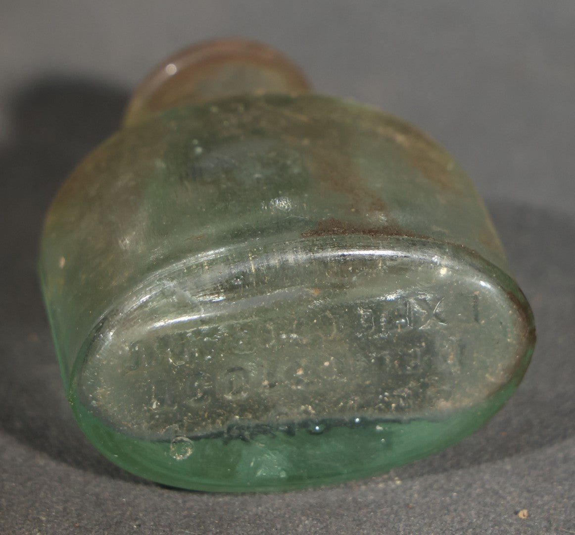 Grouping of Seven Antique Glass Bottles including Ethyl Chloride U.S.P. Anaesthesia Tube and Embossed Pharmaceutical Bottles
