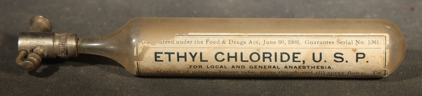 Grouping of Seven Antique Glass Bottles including Ethyl Chloride U.S.P. Anaesthesia Tube and Embossed Pharmaceutical Bottles
