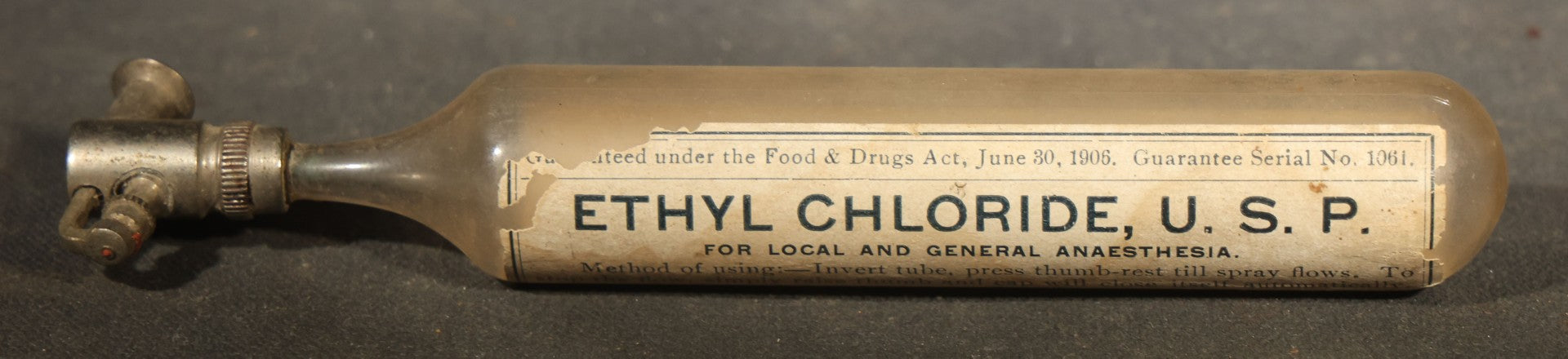 Grouping of Seven Antique Glass Bottles including Ethyl Chloride U.S.P. Anaesthesia Tube and Embossed Pharmaceutical Bottles