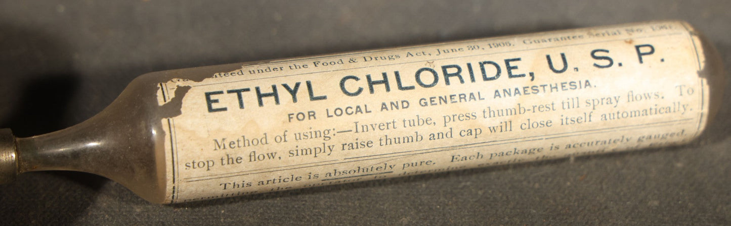 Grouping of Seven Antique Glass Bottles including Ethyl Chloride U.S.P. Anaesthesia Tube and Embossed Pharmaceutical Bottles
